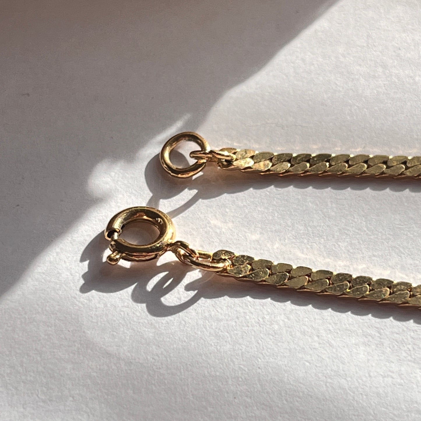 1980s Trifari Diamanté Black Enamel Gold Plated Bow Pendant Necklace
