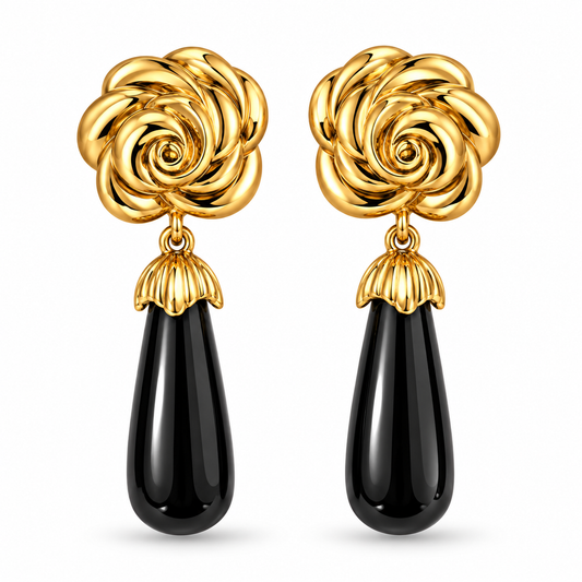 1980s Monet Gold Plated Flower Black Enamel Dangly Clip On Earrings