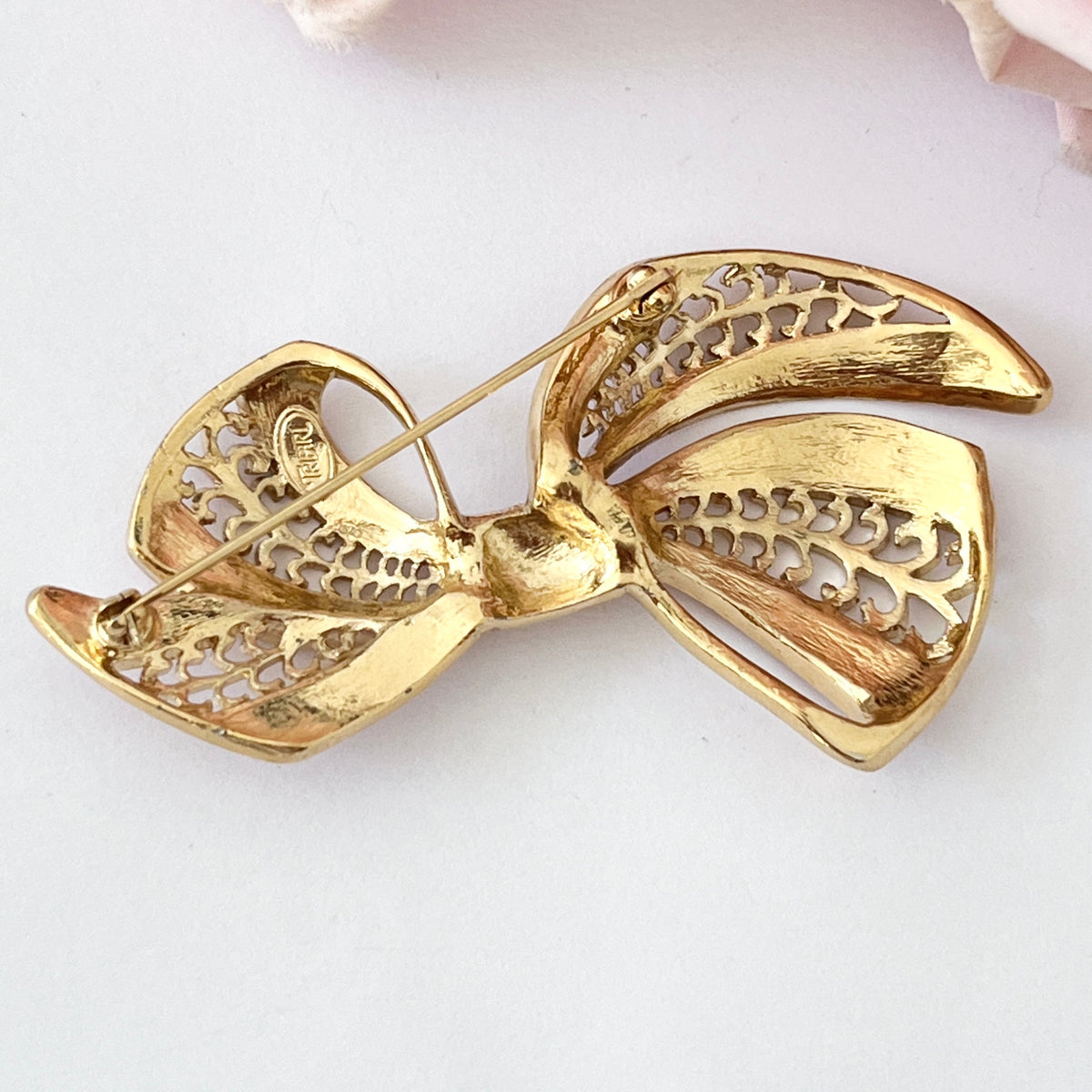 1980s Trifari Gold Plated Pink Enamel Large Statement Ribbon Bow Brooch