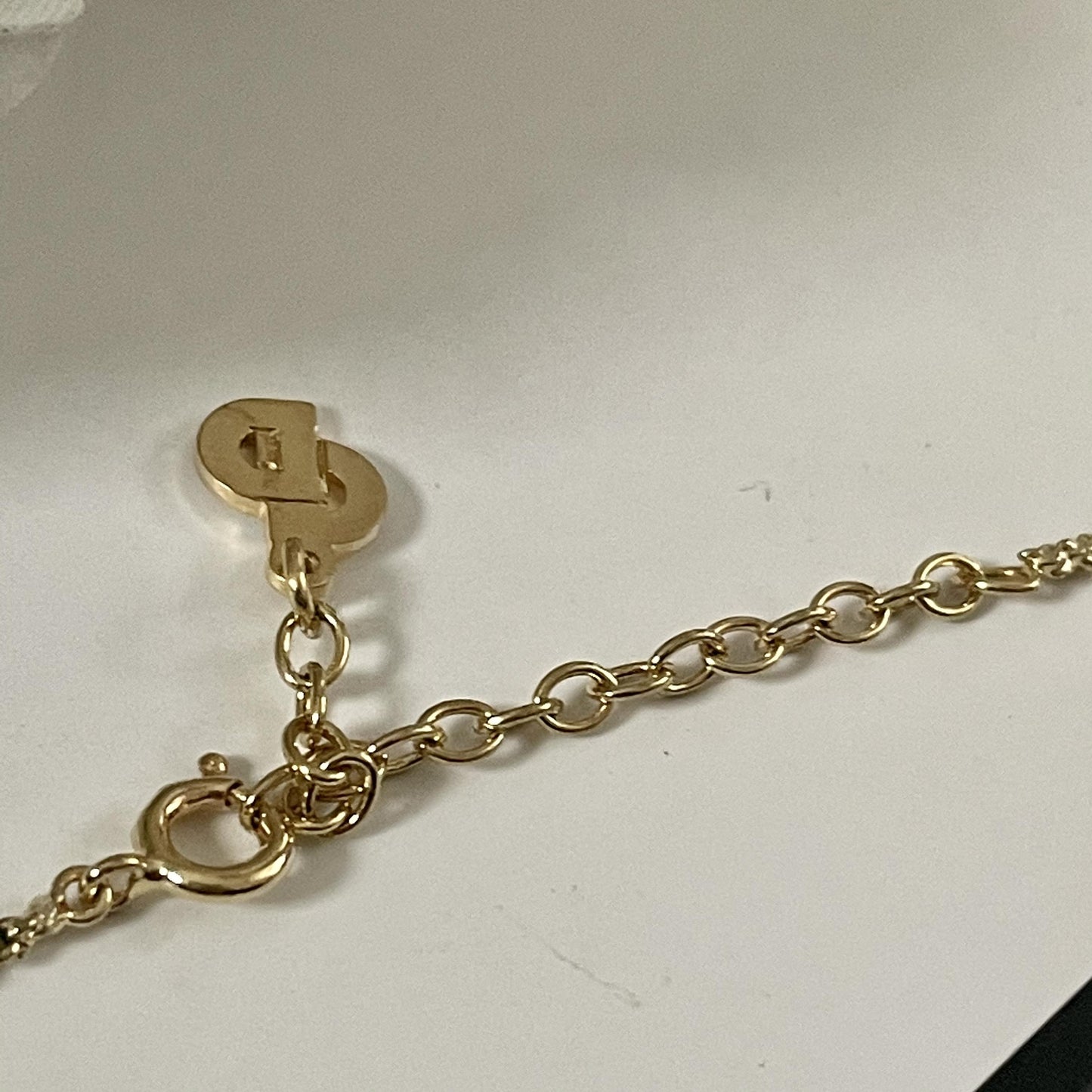 1980s Dior Gold Plated Love Knot Pendant