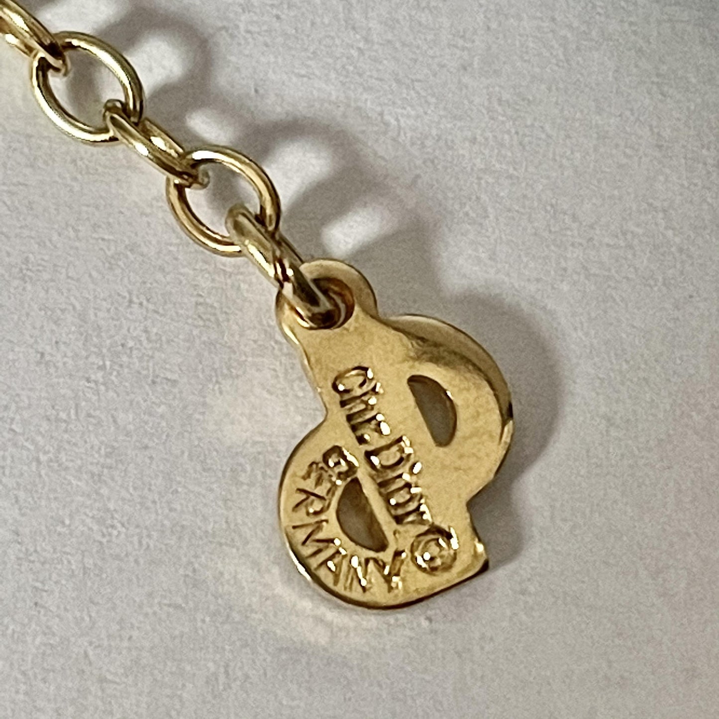 1980s Dior Gold Plated Love Knot Pendant